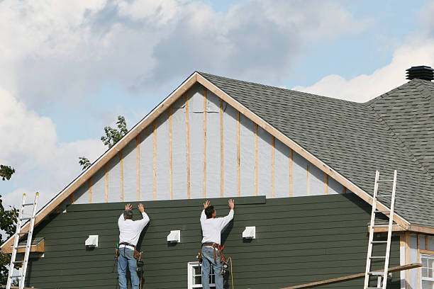 Professional Siding technician working in Laurel, IN